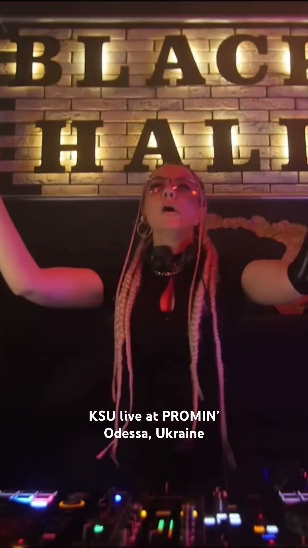 KSU with her arms raised at the decks in Black Hall